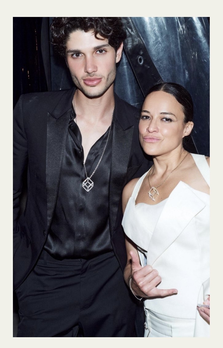 Michelle Rodriguez wearing the Djihan Cube Mirage Icon necklace